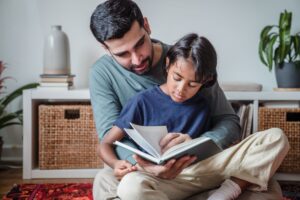 Father reading with his child